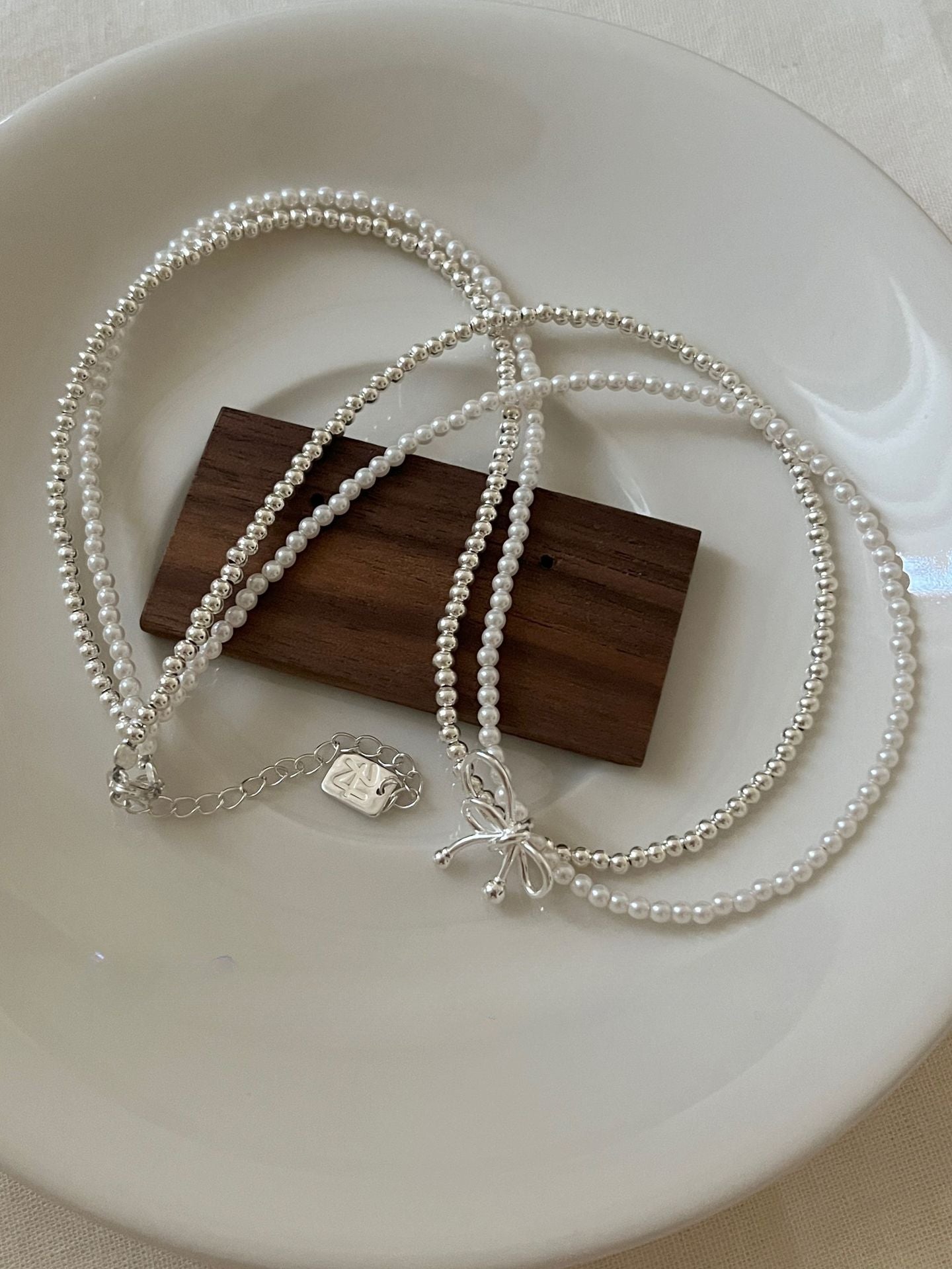 S925 Sterling Silver Bow Double Layered White Pearl Necklace Layered with High-end Collarbone Chain