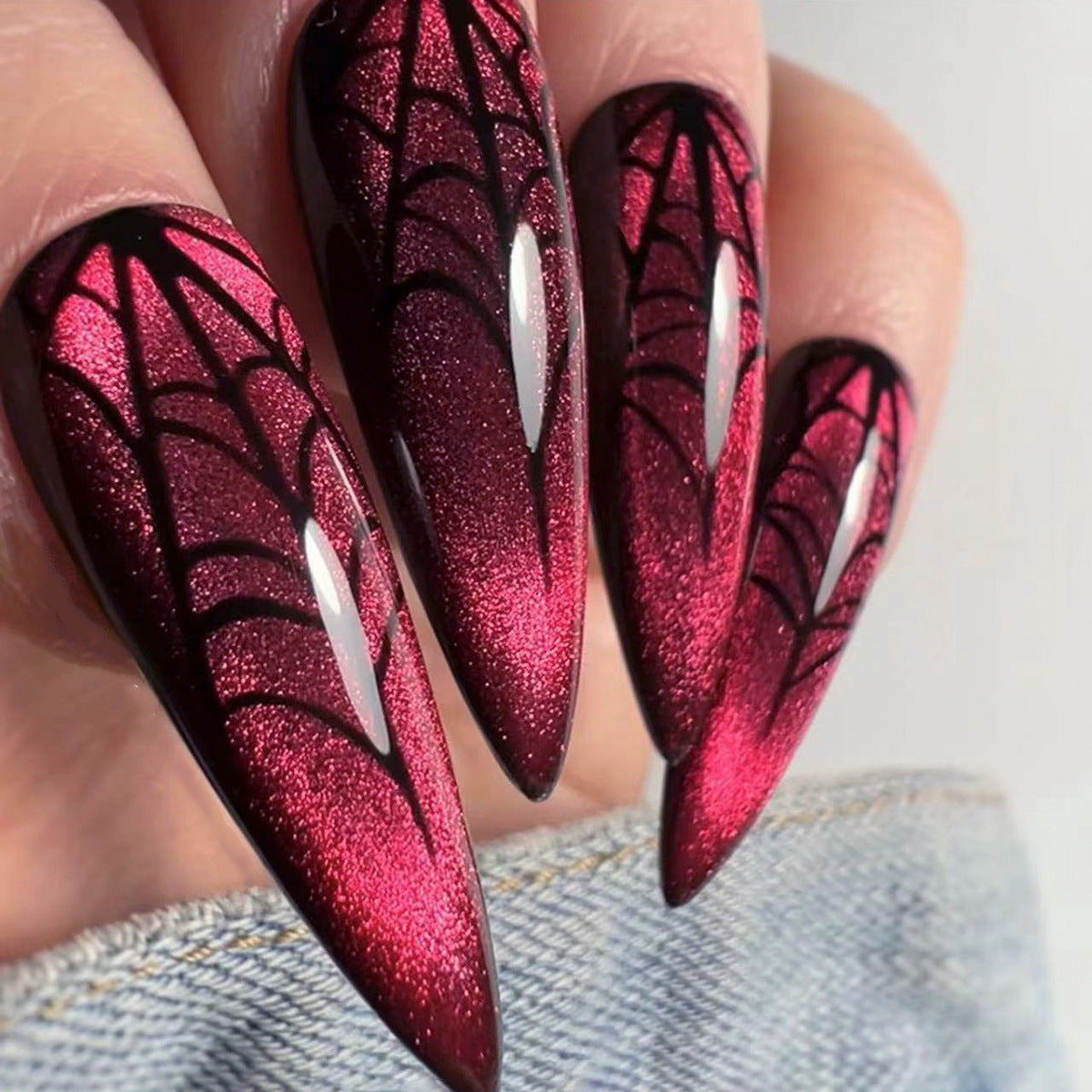 Arte de uñas con ojos de gato rojos, arte de uñas de Halloween, arte de uñas puntiagudas